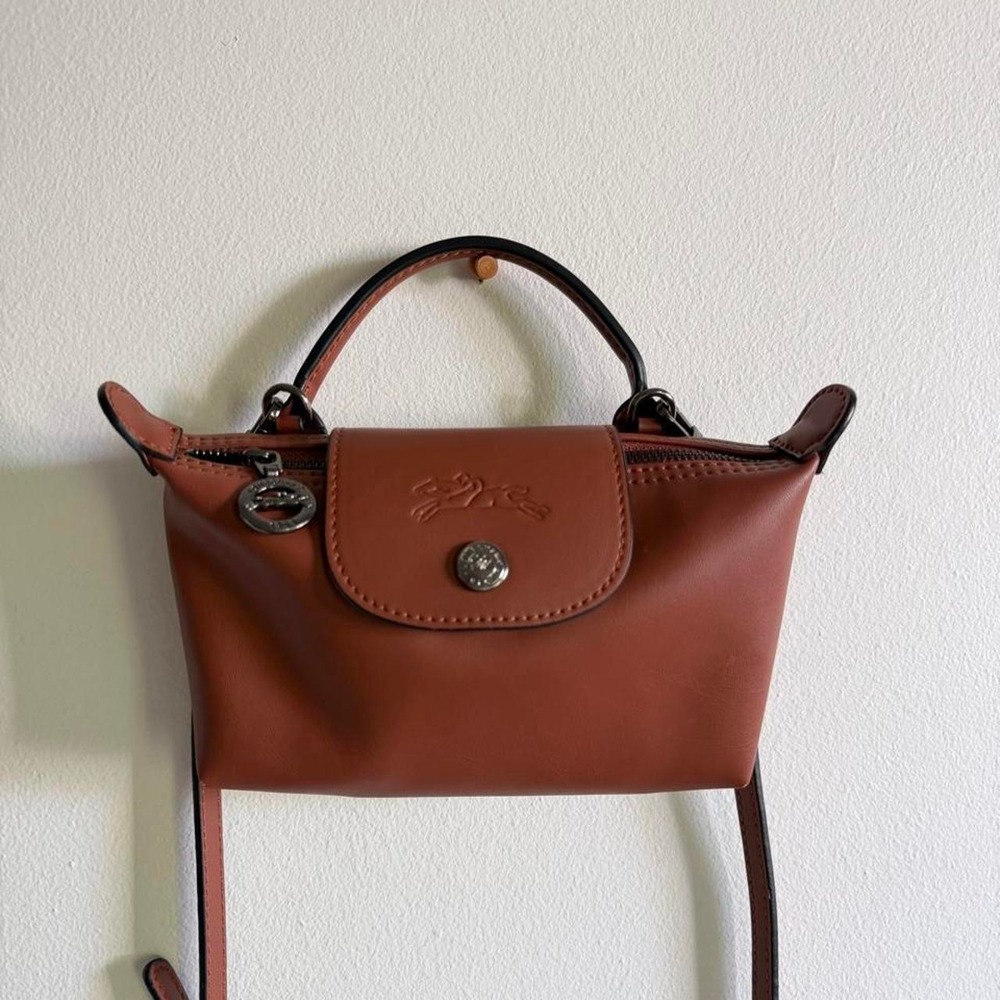 Longchamp Le Pliage brown leather mini bag with silver hardware